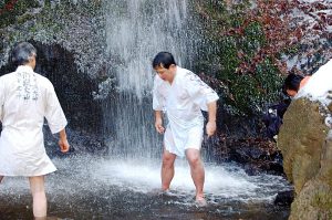 Misogi – a Shinto Purification Ritual of Standing Under a Waterfall in Winter