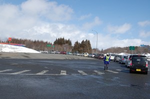 Cars lined up to get gas at the Bandaisan service area on the Banetsu expressway in Fukushima
