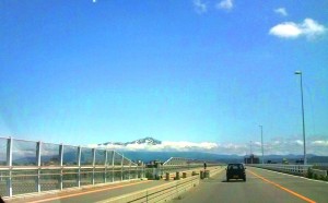 On a bridge in Tsuruoka. Mt. Chokai can been seen in the background.
