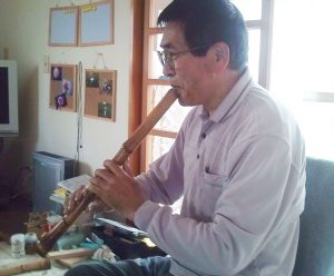 Mr. Murata playing the Shakuhachi