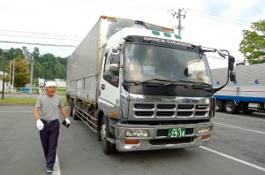 The truck driver and his rig that took me to Aomori City.