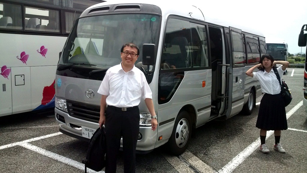 A group bus and its driver, Kensuke Inoue. He took me from Otsu shiga prefecture  (near Kyoto) all the way to Ishikawa Ken where he treated me to lunch. The passengers of the bus are of a religious sect of Shinto called "WorldMate". 