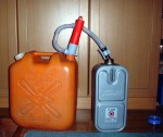 Jerry can of kerosene with pump to fill heater