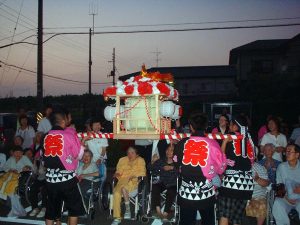 Japanese carrying the Omikoshi