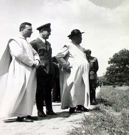 Vatican legate, or personal representative from the Pope to the NDH from 1941 to 1945, Ramiro Marcone, right, with Ustasha leader Ante Pavelic, center. The Vatican Secretary to the Vatican legate is Giuseppe Masucci on left. The Vatican de facto recognized the Independent State of Croatia and established diplomatic relations.