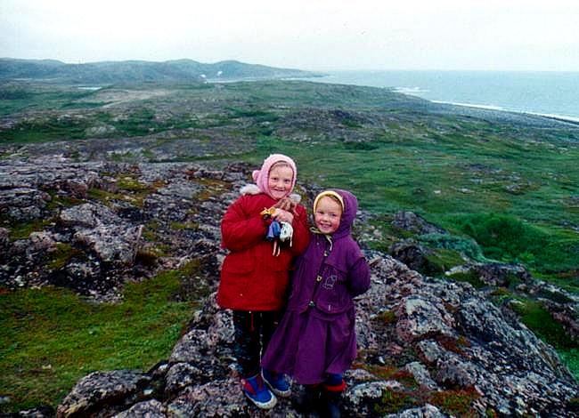 Marina's daughter (right) with a friend on a hill overlooking the Barents Sea (part of the Arctic Ocean). It's August 1st but only 13 degrees Celsius (55F) and windy.